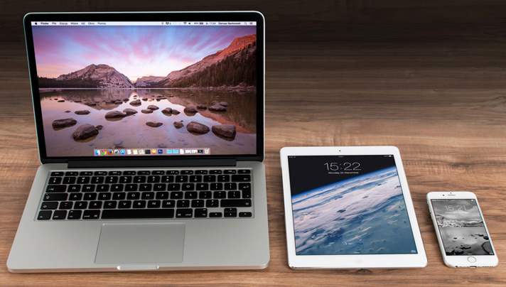 A laptop, tablet and mobile phone.